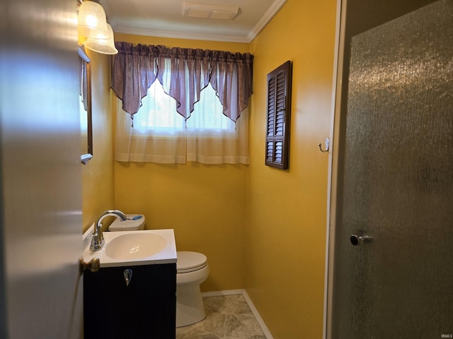 bathroom featuring toilet, visible vents, baseboards, vanity, and ornamental molding