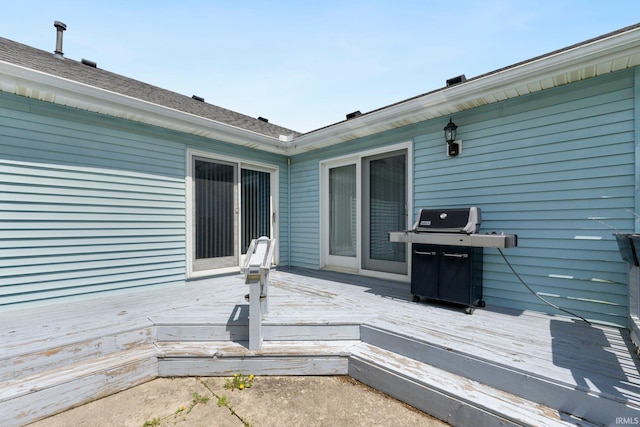 wooden terrace with grilling area