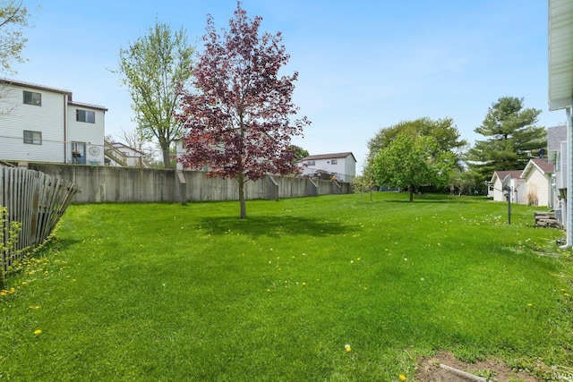 view of yard with fence