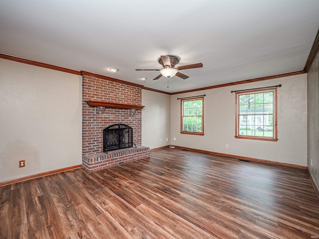 unfurnished living room with wood finished floors, baseboards, ceiling fan, and a fireplace