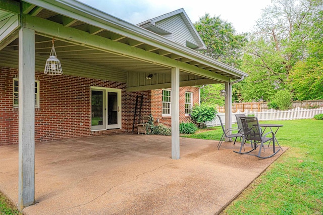view of patio featuring fence