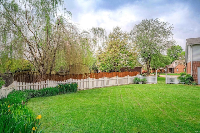 view of yard with fence