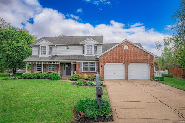 traditional-style house featuring brick siding, fence, a garage, concrete driveway, and a front lawn
