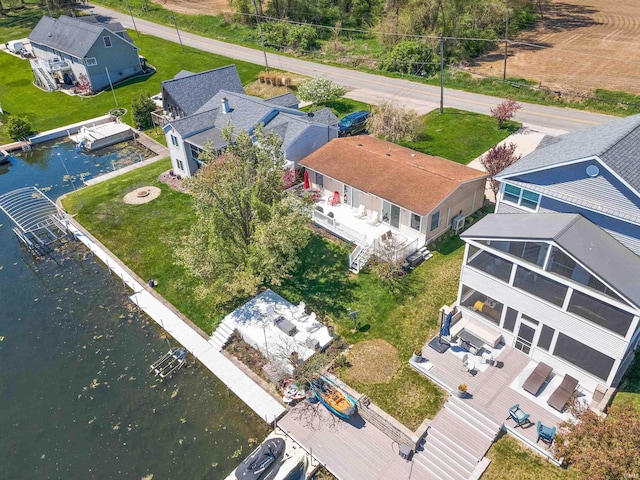 aerial view featuring a water view and a residential view