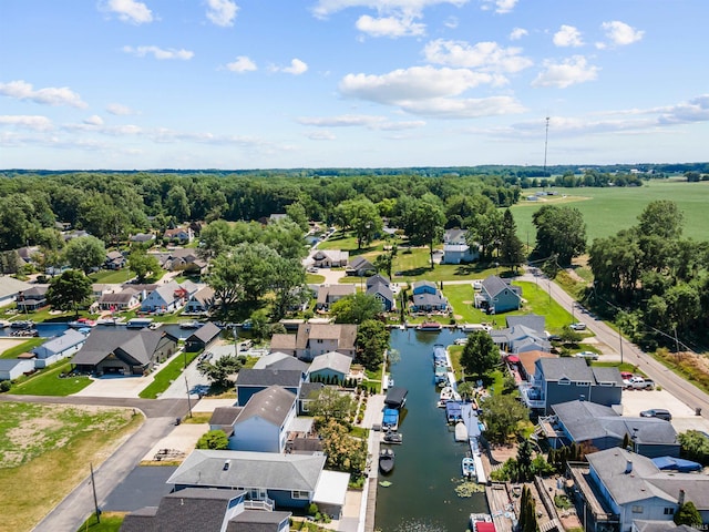 aerial view with a water view and a residential view