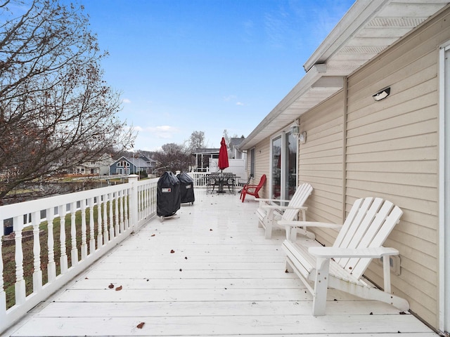 deck featuring outdoor dining space