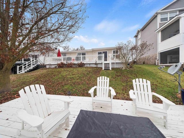 exterior space with a yard and a deck