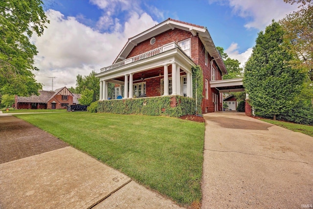 104 W Main St, Worthington, IN 47471 - craftsman-style house with a porch, brick siding, driveway, ceiling fan, and a front lawn