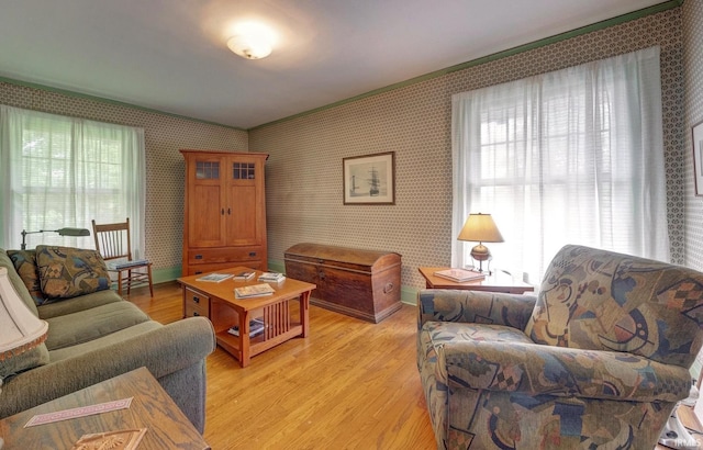 104 W Main St, Worthington, IN 47471 - living room featuring baseboards, light wood finished floors, and wallpapered walls