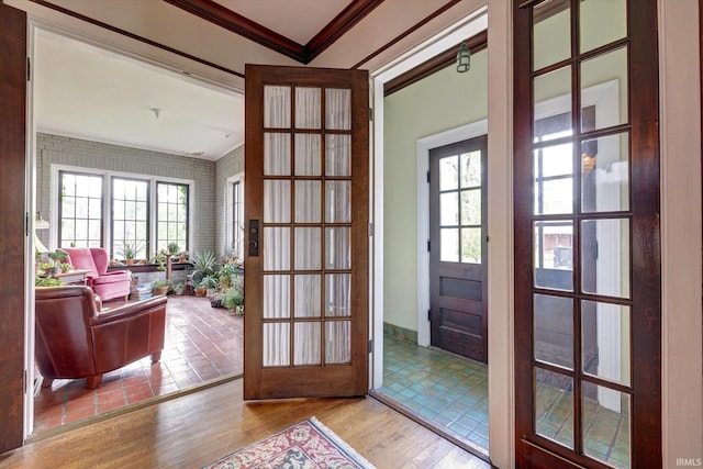 104 W Main St, Worthington, IN 47471 - entryway featuring crown molding and wood finished floors