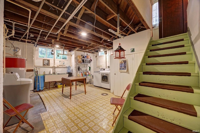 104 W Main St, Worthington, IN 47471 - basement featuring stairs, water heater, a sink, and washer and clothes dryer
