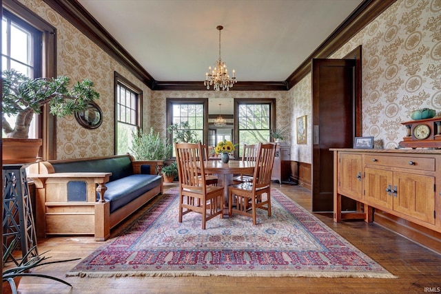 104 W Main St, Worthington, IN 47471 - dining area with an inviting chandelier, hardwood / wood-style floors, and wallpapered walls