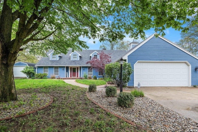 5259 E Willow Ct, Monticello, IN 47960 - cape cod home with a chimney, an attached garage, concrete driveway, a front yard, and roof with shingles