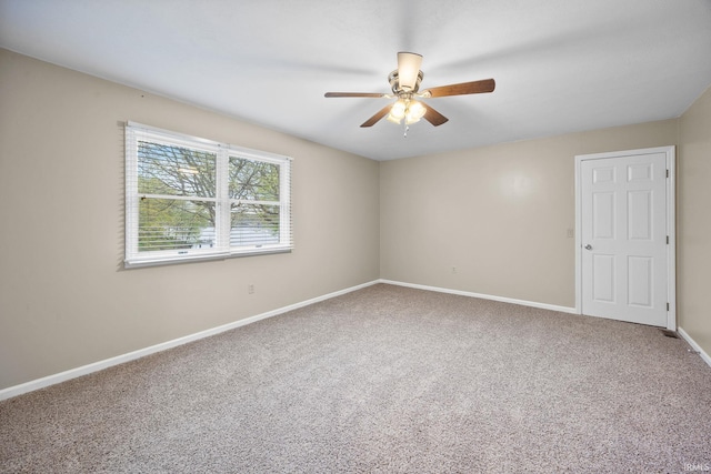5259 E Willow Ct, Monticello, IN 47960 - unfurnished room with carpet, baseboards, and a ceiling fan