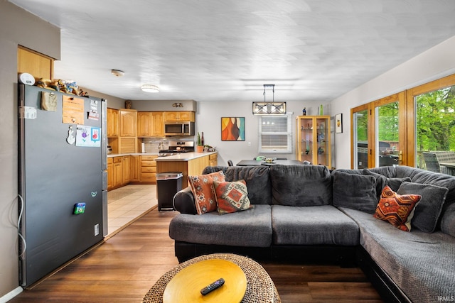 living area featuring light wood-style flooring