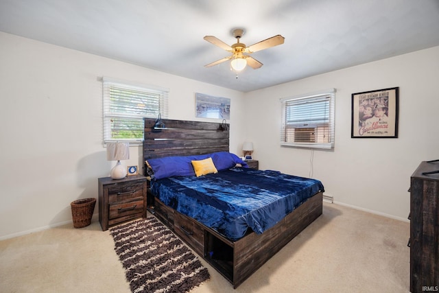 bedroom with carpet flooring, baseboards, and ceiling fan