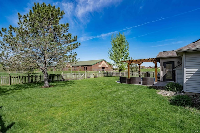 view of yard featuring a pergola and a fenced backyard