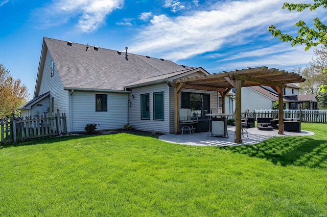 back of house with a lawn, a patio area, a pergola, a shingled roof, and a fenced backyard