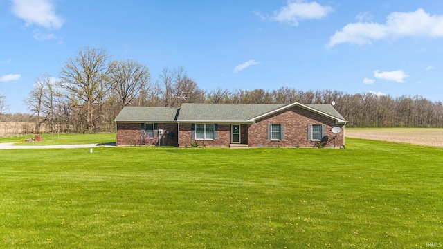 8426 W 600 S, Andrews, IN 46702 - single story home with a front lawn and brick siding