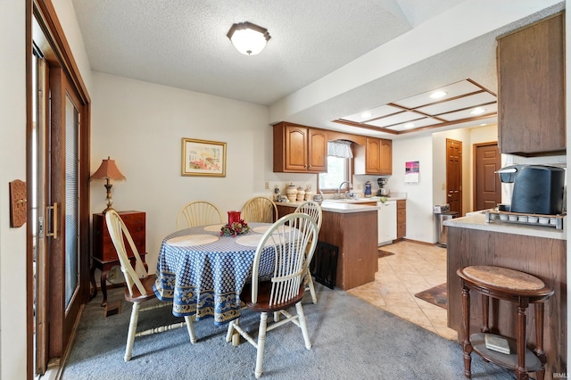 dining room featuring baseboards, recessed lighting, light tile patterned flooring, and a textured ceiling