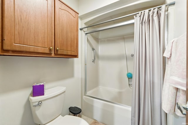 full bathroom with shower / bath combo with shower curtain and toilet