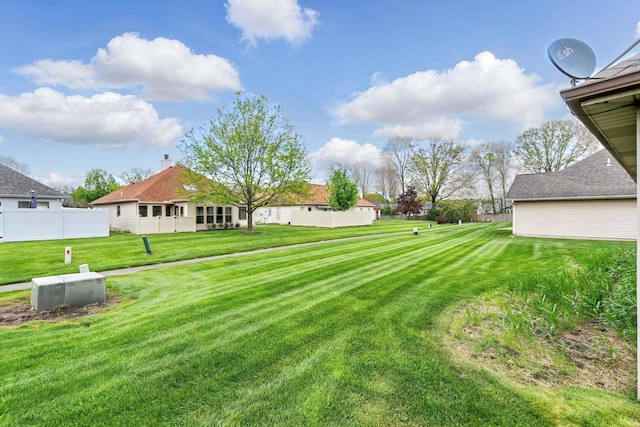 view of yard featuring fence