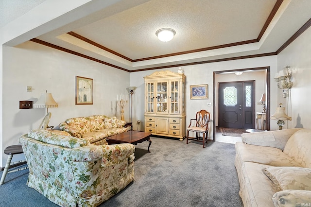 living room featuring carpet flooring, a raised ceiling, ornamental molding, and a textured ceiling