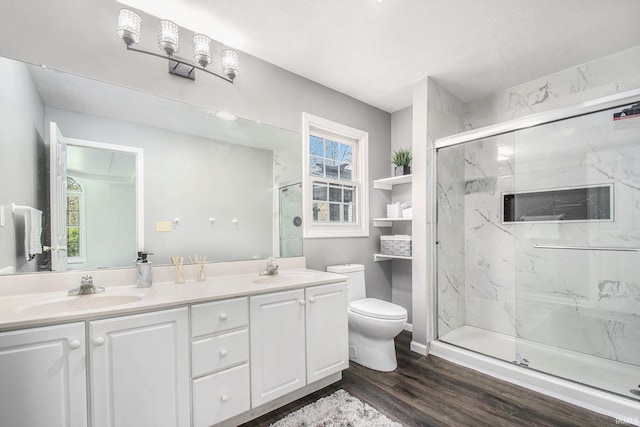 21521 Cheri Ln, Bristol, IN 46507 - full bath featuring toilet, a marble finish shower, wood finished floors, and a sink