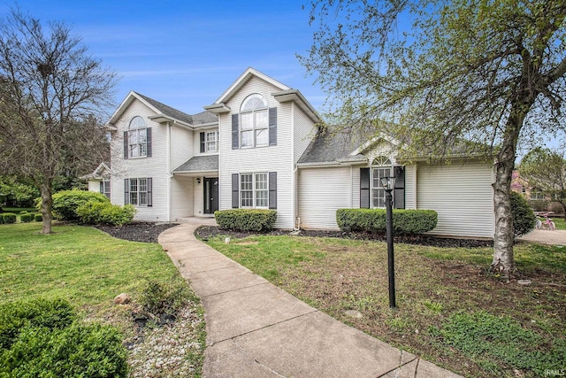 21521 Cheri Ln, Bristol, IN 46507 - traditional home featuring roof with shingles and a front lawn
