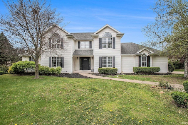 21521 Cheri Ln, Bristol, IN 46507 - traditional-style house featuring roof with shingles and a front yard