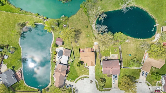 aerial view featuring a water view and a residential view