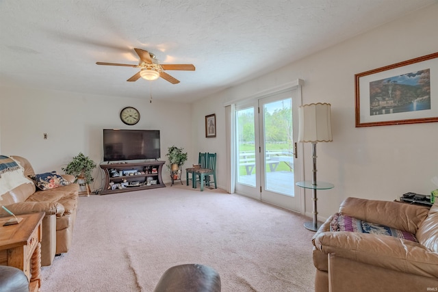 1112 W Walnut St, Summitville, IN 46070 - living room featuring a ceiling fan and carpet floors