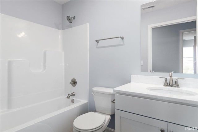 full bathroom featuring shower / bath combination, vanity, toilet, and visible vents