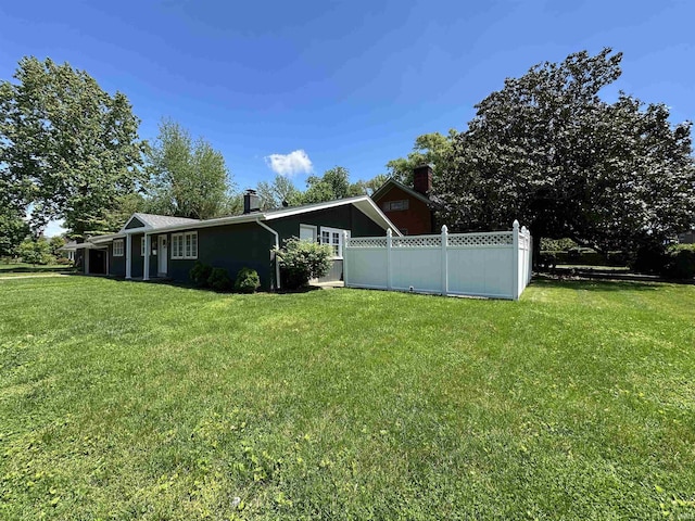 view of yard with fence