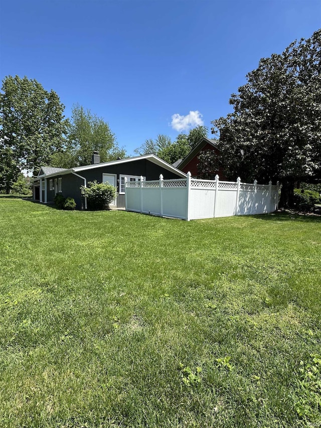 view of yard featuring fence