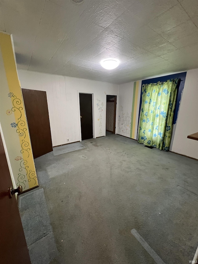 unfurnished bedroom with carpet floors