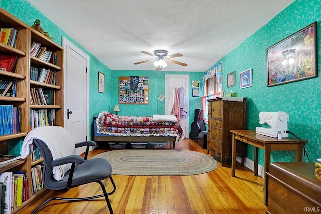 3806 S State Road 3, New Castle, IN 47362 - sitting room featuring ceiling fan, wallpapered walls, and hardwood / wood-style floors