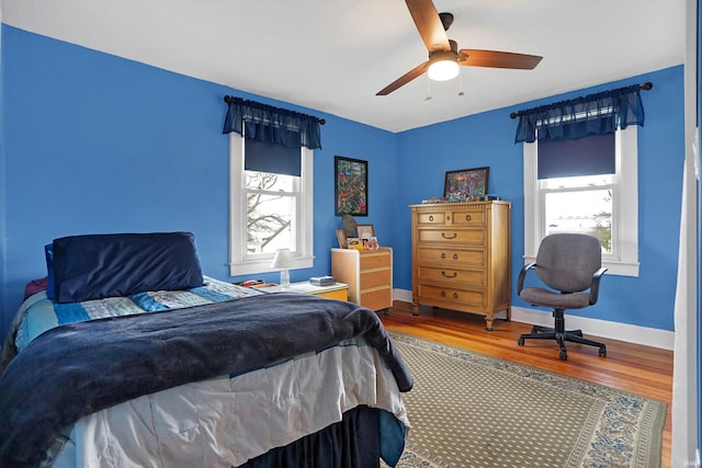 3806 S State Road 3, New Castle, IN 47362 - bedroom with ceiling fan, baseboards, and wood finished floors
