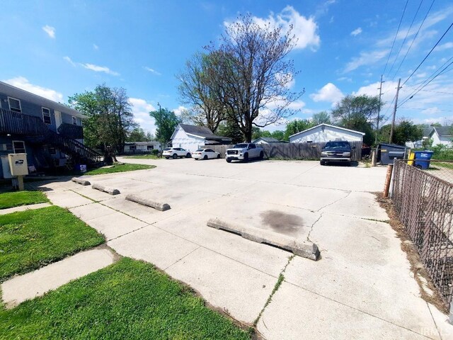 2225 S Hoyt Ave, Muncie, IN 47302 - exterior space featuring driveway and stairway