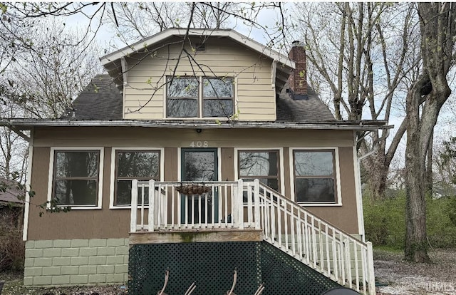 408 N 8th St, Petersburg, IN 47567 - view of front of property featuring roof with shingles and a chimney