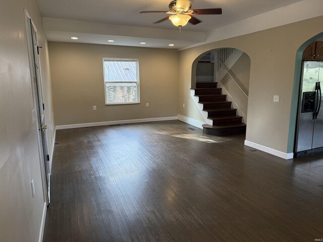 408 N 8th St, Petersburg, IN 47567 - empty room with a ceiling fan, arched walkways, dark wood finished floors, recessed lighting, and baseboards