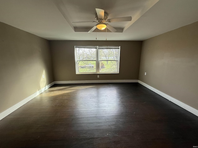 408 N 8th St, Petersburg, IN 47567 - unfurnished room featuring dark wood-type flooring, baseboards, and ceiling fan