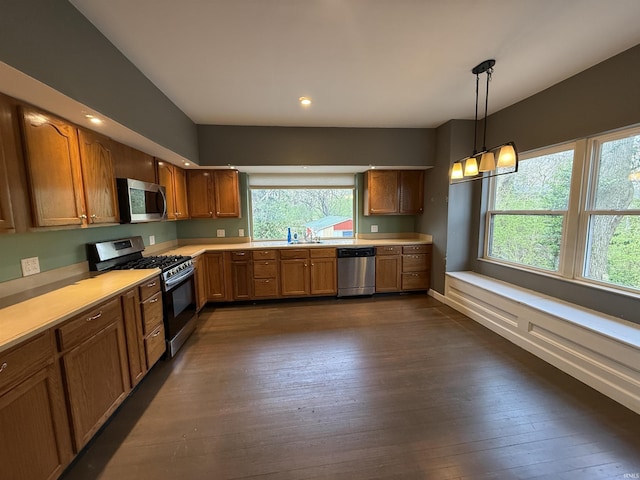 408 N 8th St, Petersburg, IN 47567 - kitchen with appliances with stainless steel finishes, light countertops, dark wood-style floors, brown cabinets, and recessed lighting