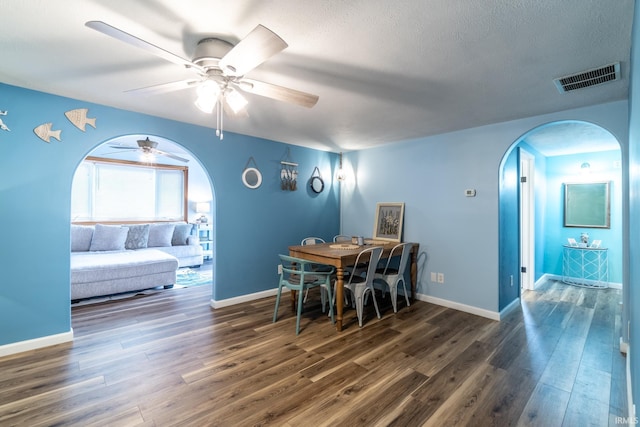 11910 E 690 S, Hudson, IN 46747 - dining room with arched walkways, a ceiling fan, visible vents, and wood finished floors
