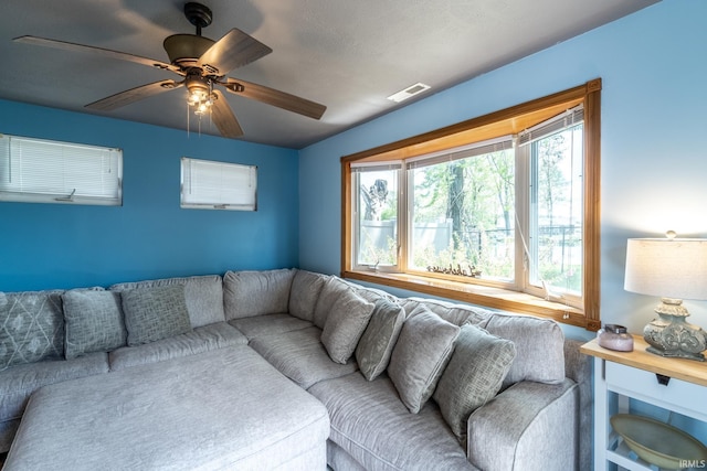 11910 E 690 S, Hudson, IN 46747 - living room with ceiling fan and visible vents