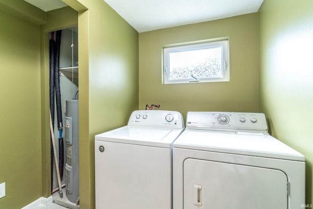 11910 E 690 S, Hudson, IN 46747 - laundry room with electric water heater, laundry area, and washer and clothes dryer