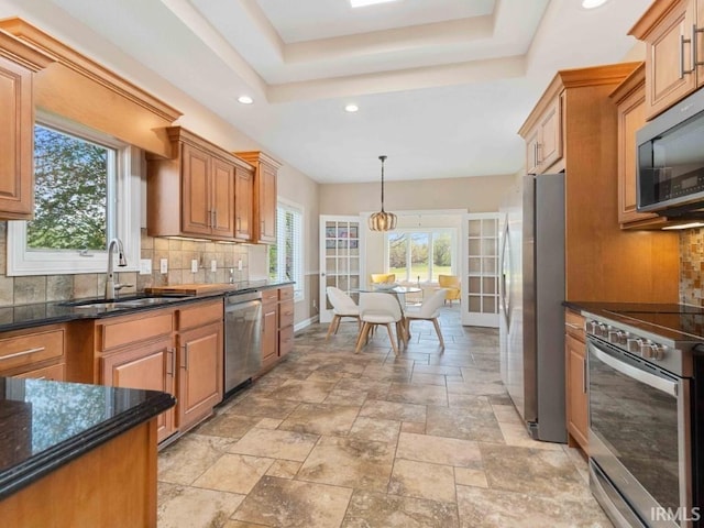 1817 Prestwick Ln, Fort Wayne, IN 46814 - kitchen with backsplash, recessed lighting, appliances with stainless steel finishes, and a sink