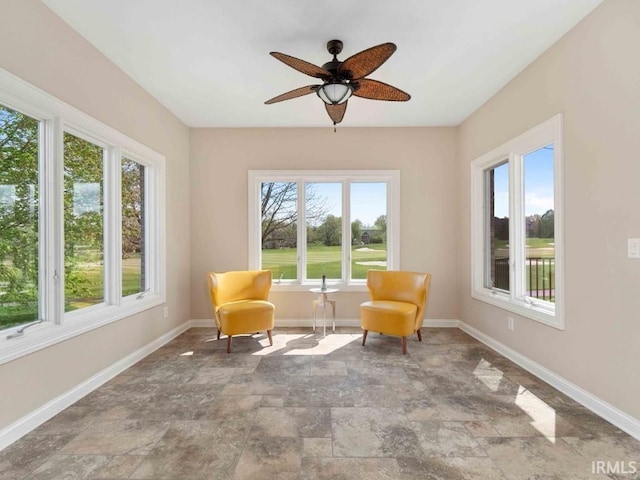 1817 Prestwick Ln, Fort Wayne, IN 46814 - sitting room with baseboards, a ceiling fan, and stone finish floor