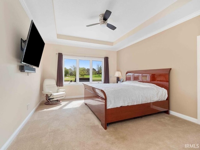 1817 Prestwick Ln, Fort Wayne, IN 46814 - carpeted bedroom with a tray ceiling, ornamental molding, baseboards, and ceiling fan