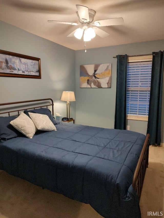 337 W White Pine Ct, Bloomington, IN 47403 - bedroom featuring ceiling fan and carpet